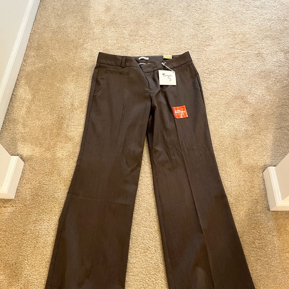 Brown/ black slacks/ Labels trouser leg